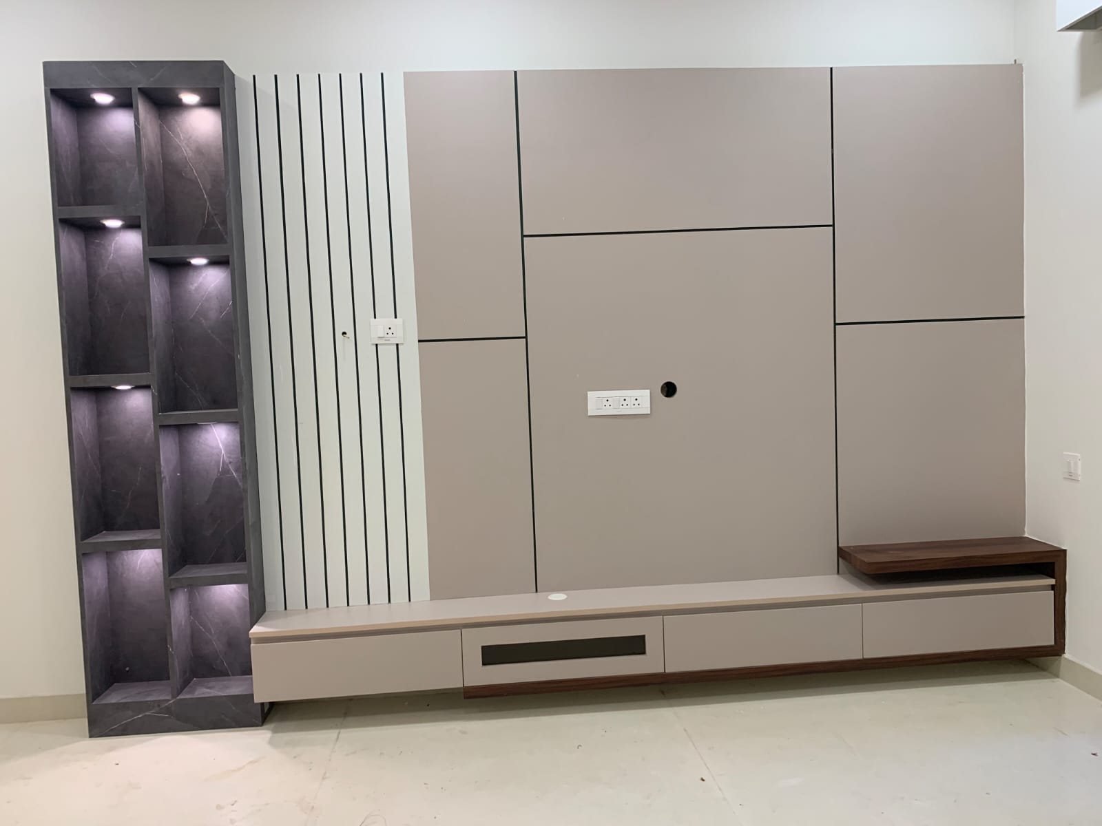 TV unit with lit display niches